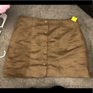 Suede skirt with gold buttons down middle